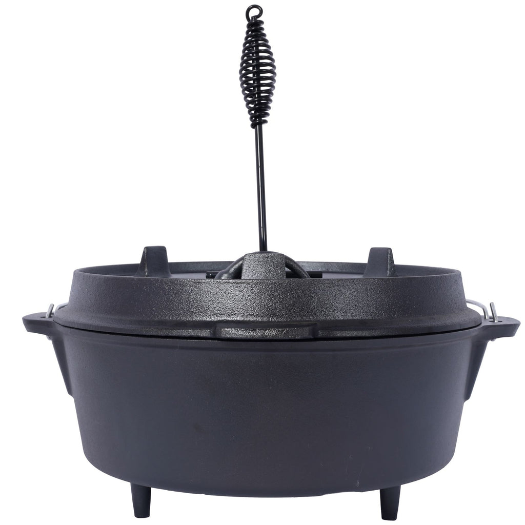 Front view of the pot on its three legs with the coiled lid lifter standing upright in the lid