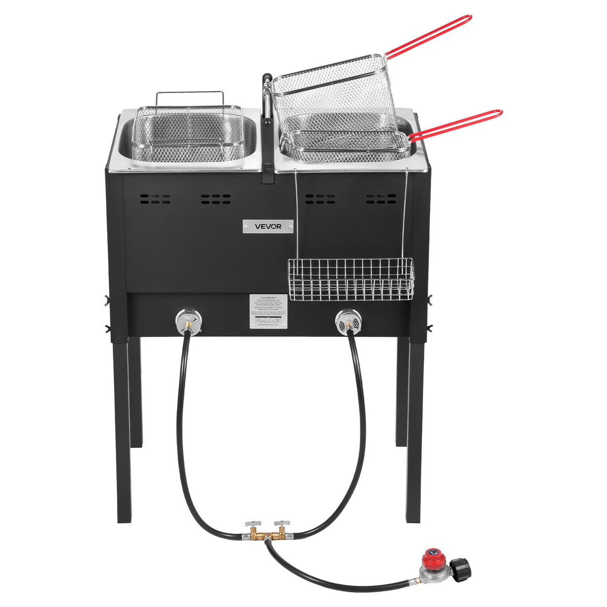 Straight-on view of the black two-tank fryer on its four-leg stand, with both baskets in place and the propane hose and regulator running from the burners
