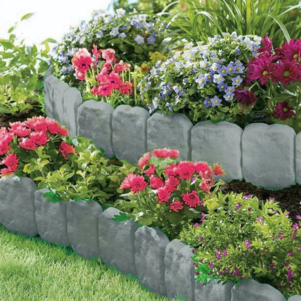 No-dig stone edging installed around a planted flower bed