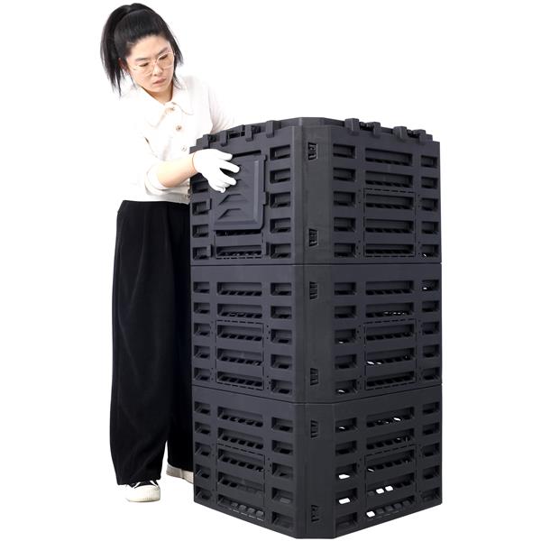 The compost bin beside a person, showing its height