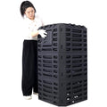 The compost bin beside a person, showing its height