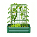 Raised bed with an arch trellis, planted with climbing crops