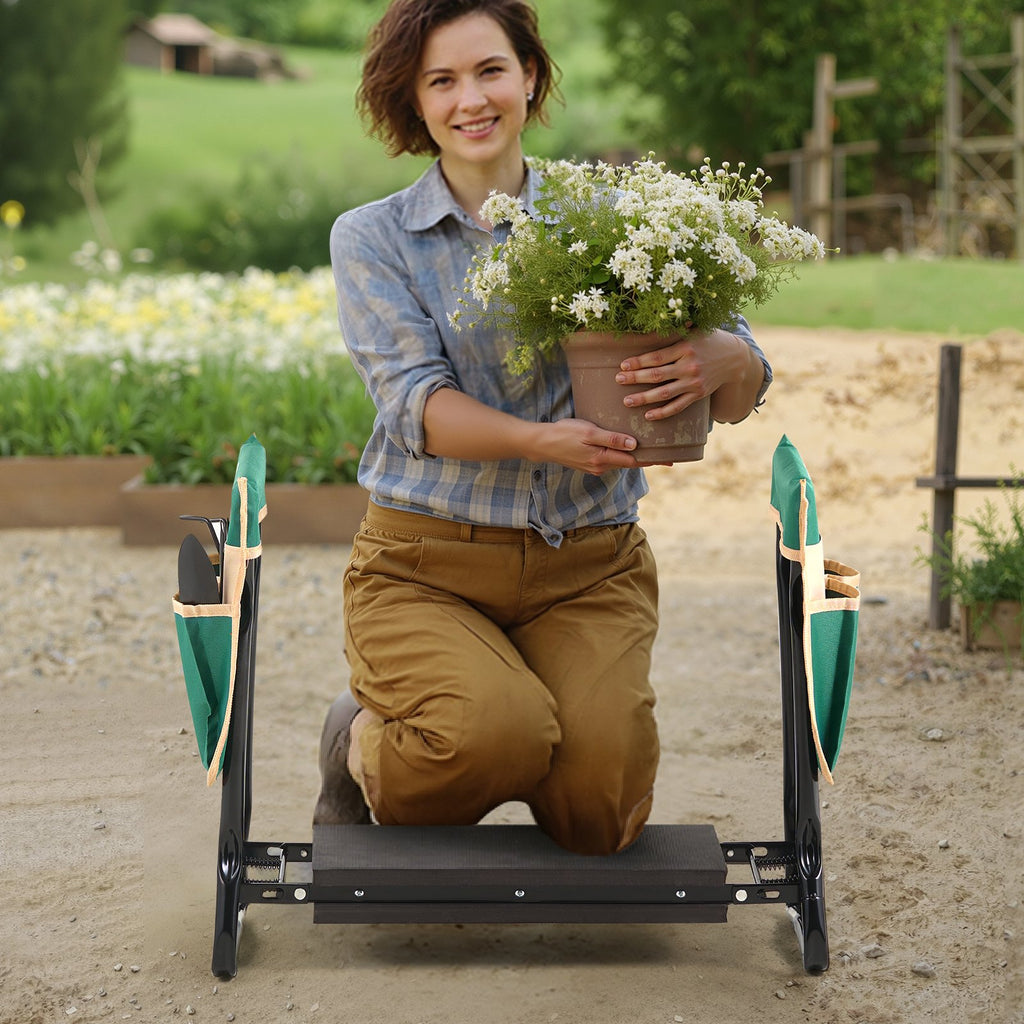 Gardener kneeling on the folding garden kneeler