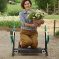 Gardener kneeling on the folding garden kneeler