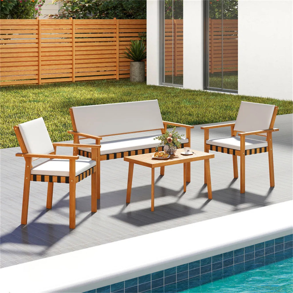 Acacia conversation set arranged beside a pool