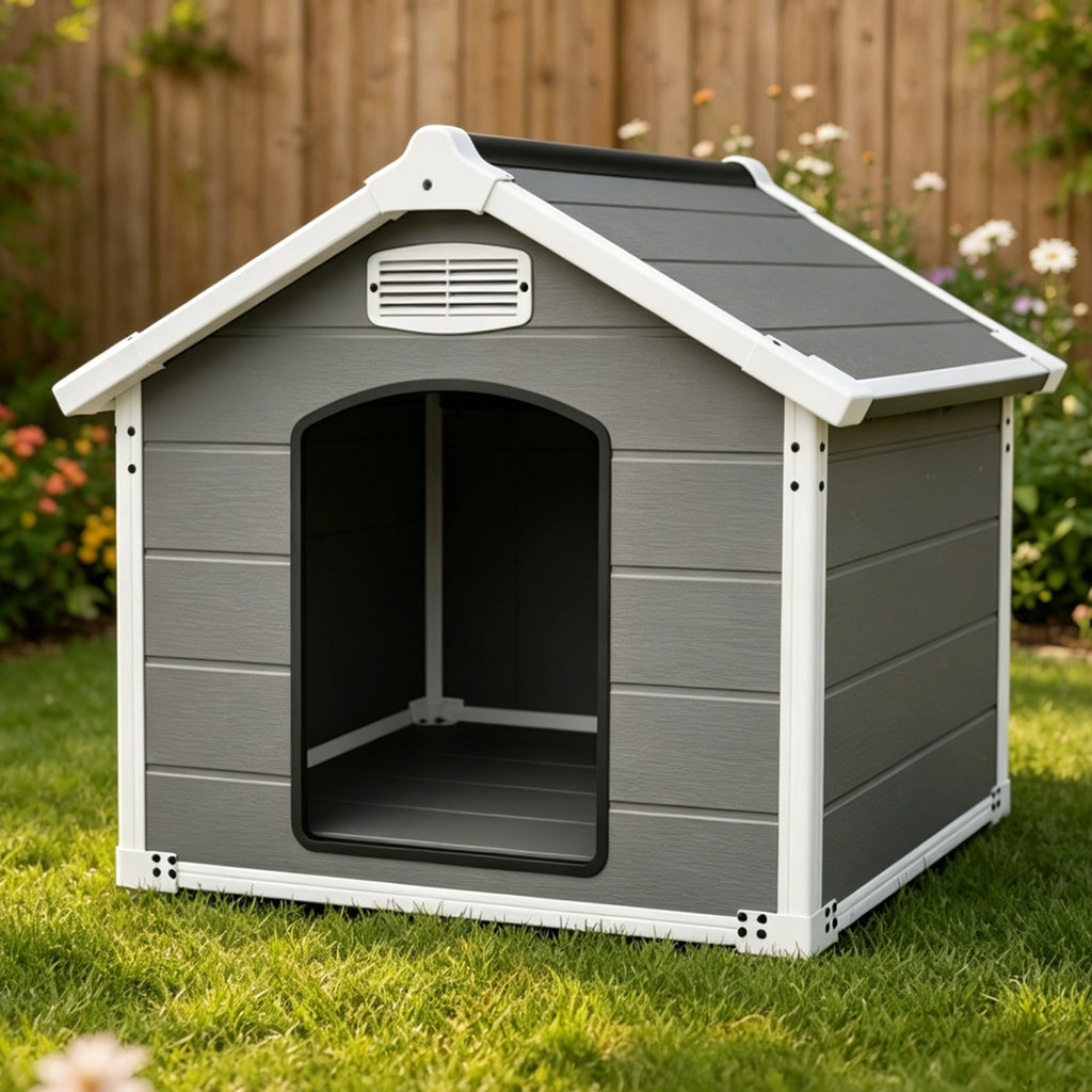 Dog house on grass beside a flower bed