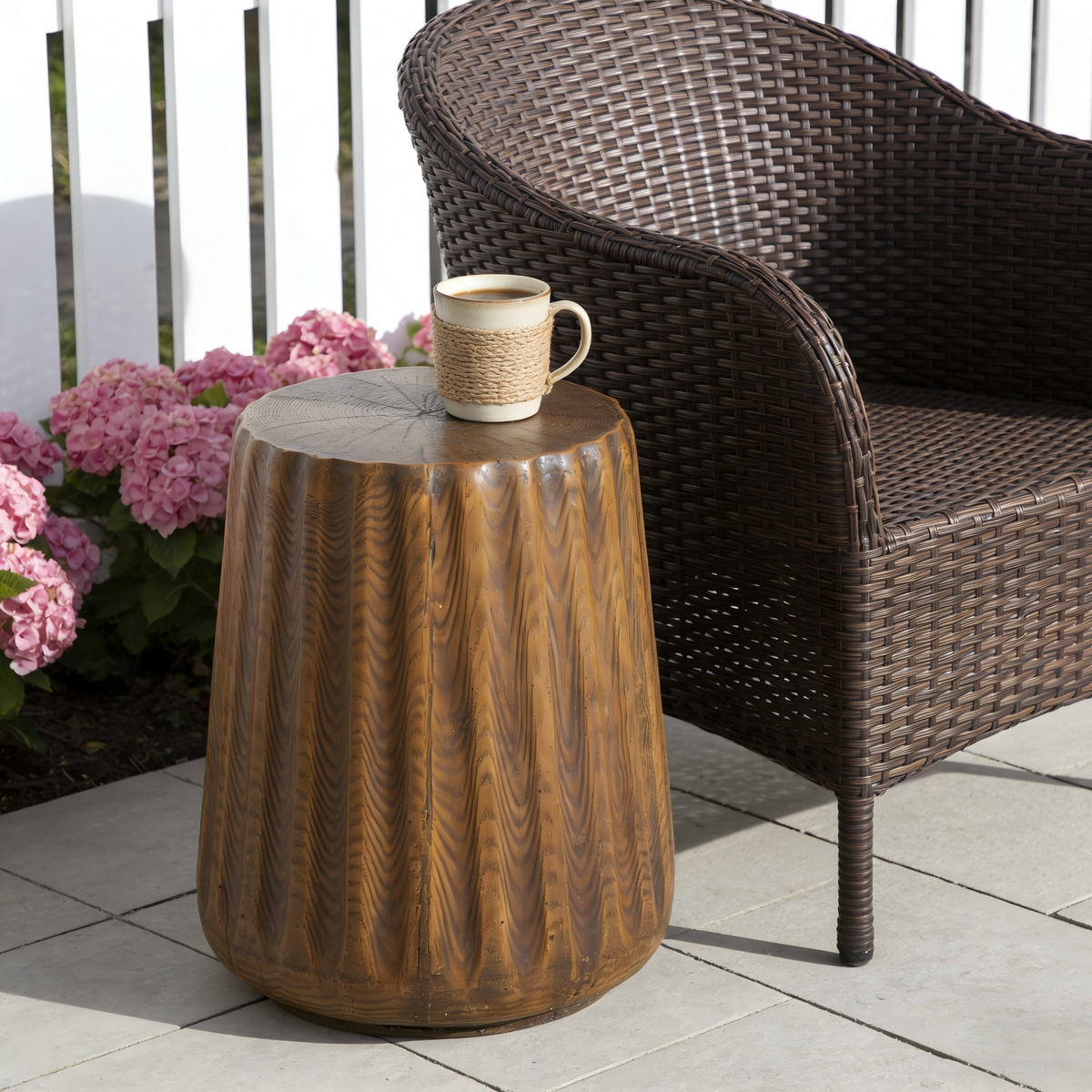 Stump side table shown in a garden setting