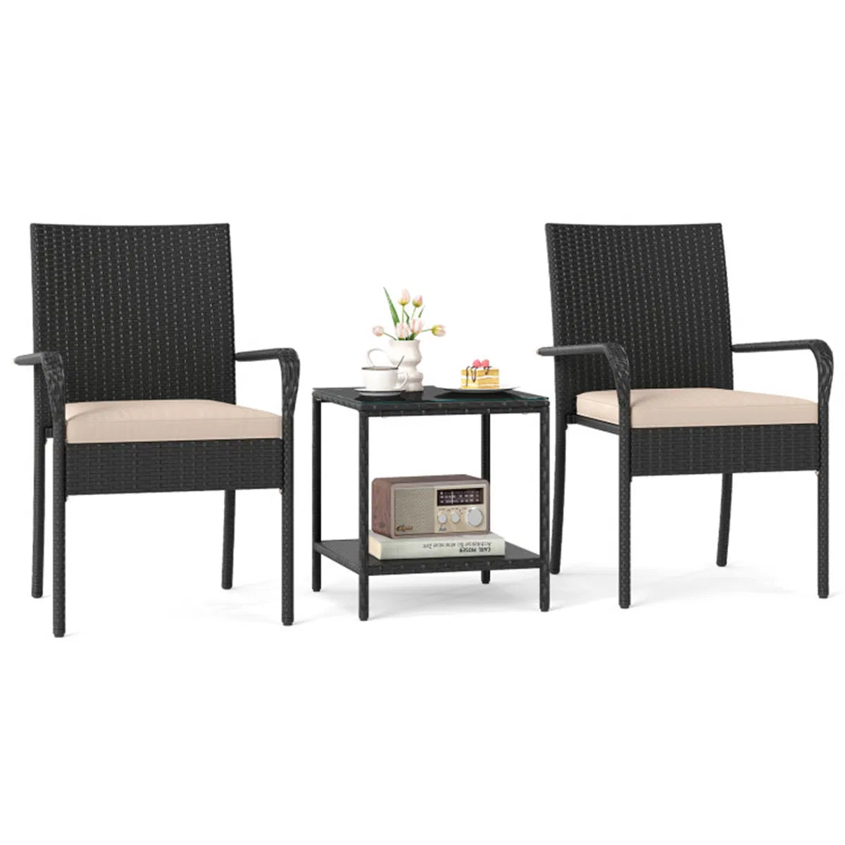 Three-piece black wicker bistro set with beige cushions and two-tier glass side table