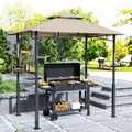 Grill gazebo set up over a barbecue on a patio