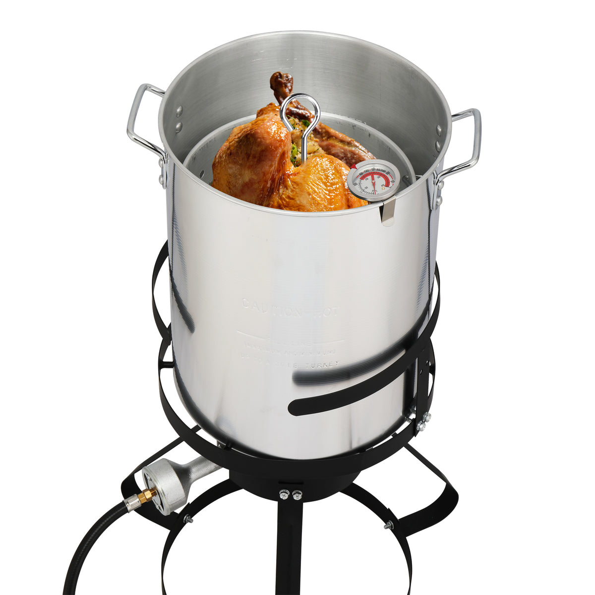 A whole turkey seated in the thirty-quart pot