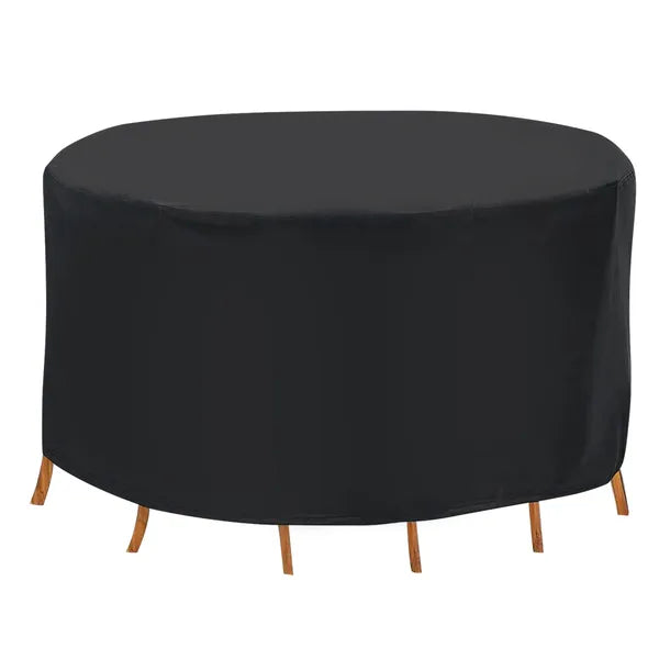 Round black patio table cover over a four-seat dining set