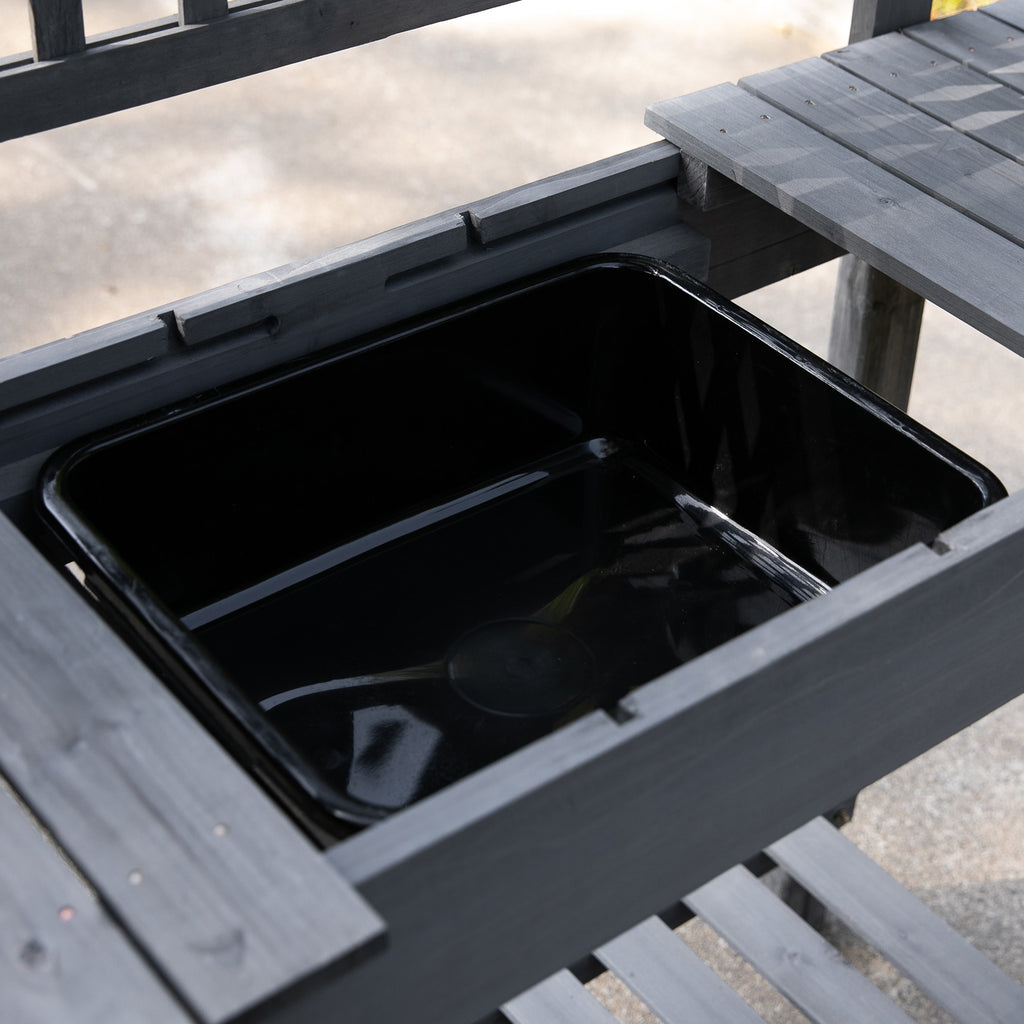Close view of the sliding top and the soil bin beneath