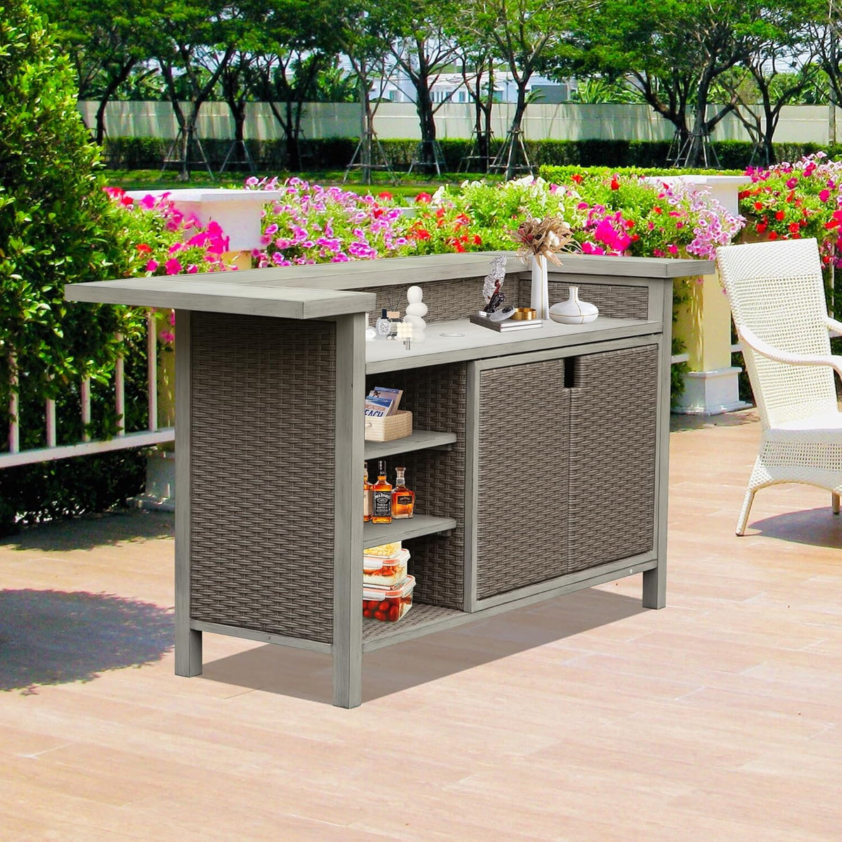 The bar table in a garden, cabinet doors open