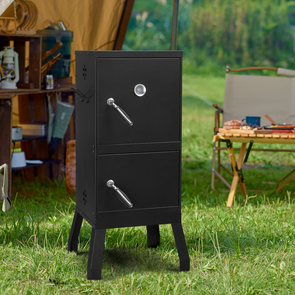 The smoker standing on grass at a campsite with a tent and folding table behind it