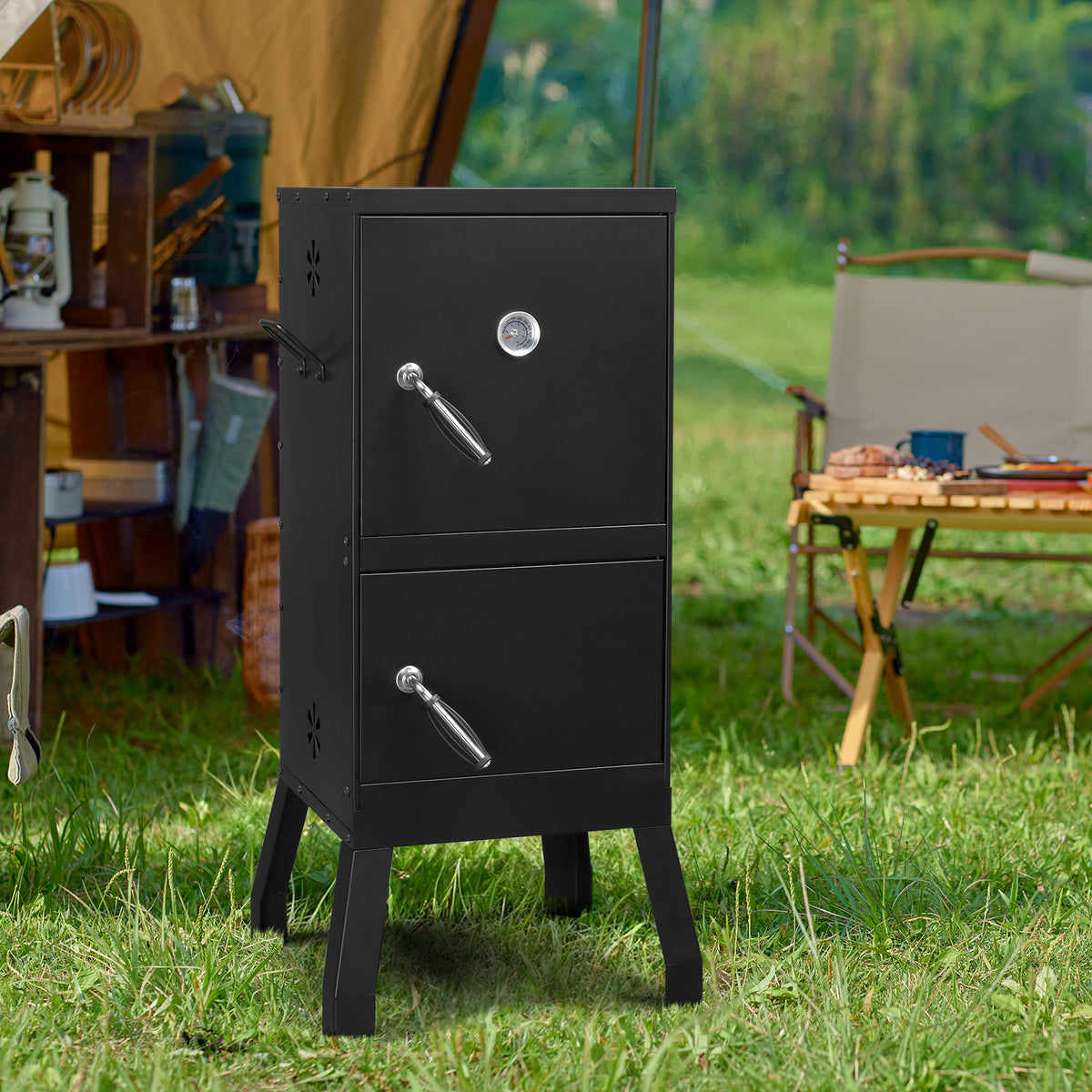 The smoker standing on grass at a campsite with a tent and folding table behind it