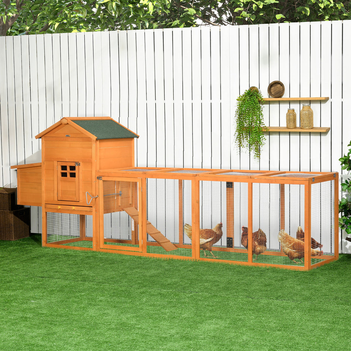 Extra large wooden chicken coop with attached run in a yard