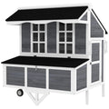 Gray mobile chicken coop with wheels