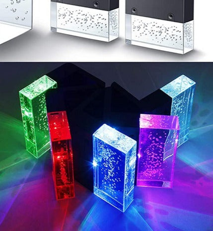 Four lights showing the green, red, blue and purple color modes